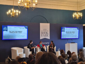 Our translation panel at the London Book Fair - translators sitting on the stage talking in front of an audience