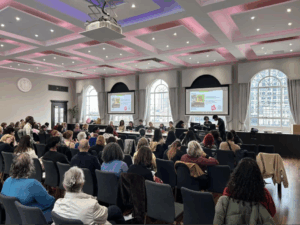 Photo of the audience and speakers at the launch of the Feminist Literary Translation book.