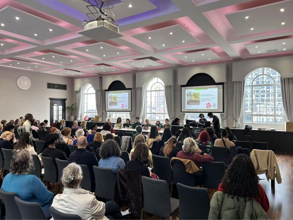 Photo of the audience and speakers at the launch of the Feminist Literary Translation book.